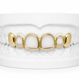 Custom open face fang grillz with diamonds in 10K gold